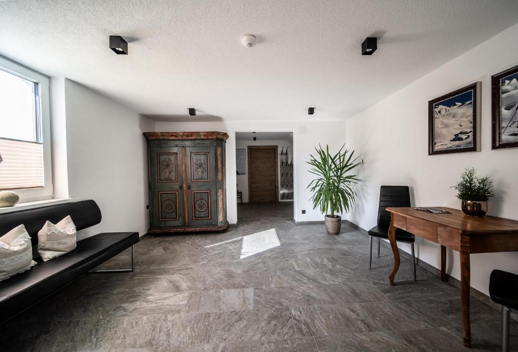 TV a/nebo společenská místnost v ubytování Appartements Tyrol