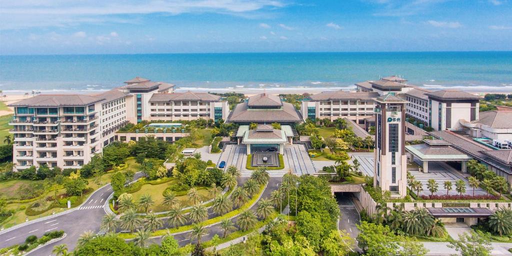 an aerial view of a resort near the ocean at Crowne Plaza Hailing Island by IHG in Yangjiang