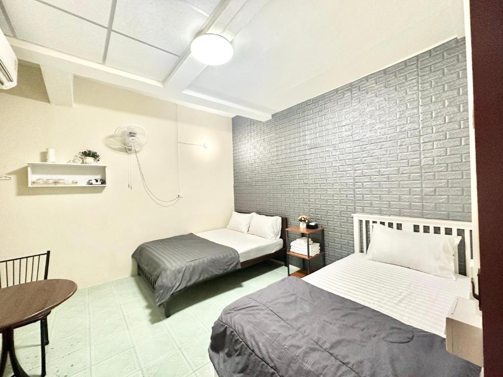 Postel nebo postele na pokoji v ubytování PD Hostel