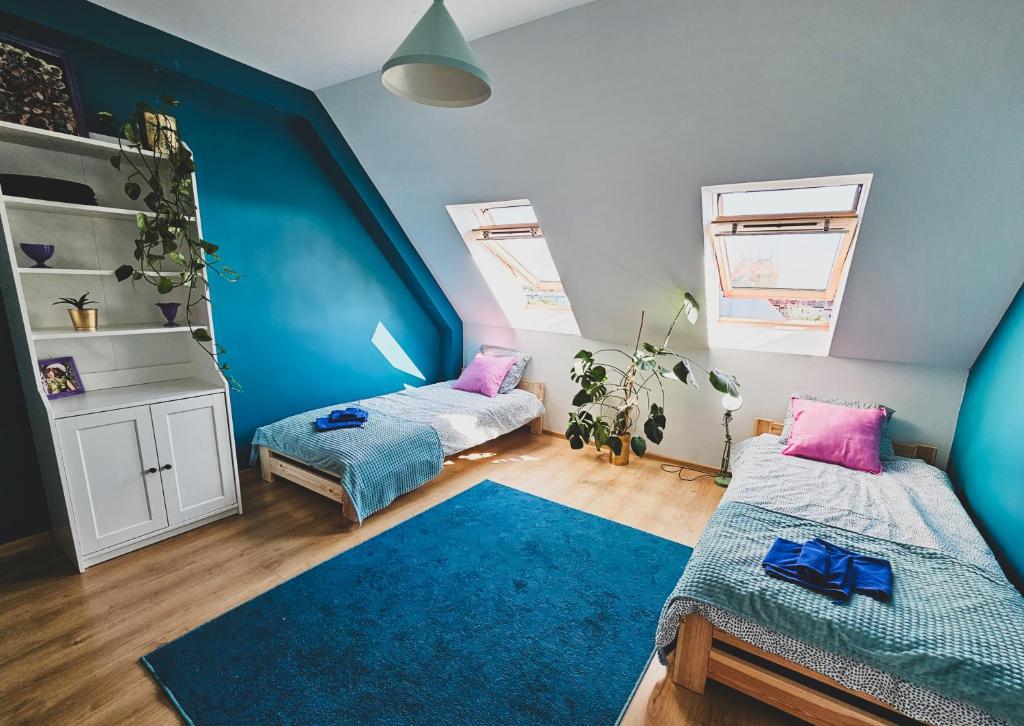 Cama o camas de una habitación en Top Roof ApARTment