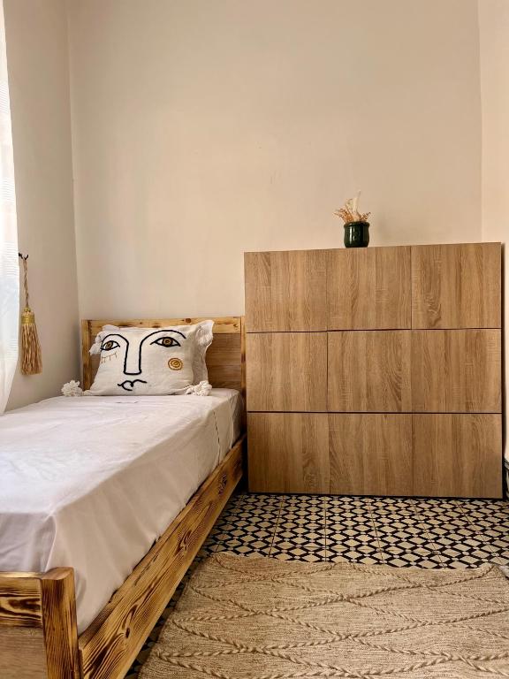 Postel nebo postele na pokoji v ubytování Peekaboo Hostel