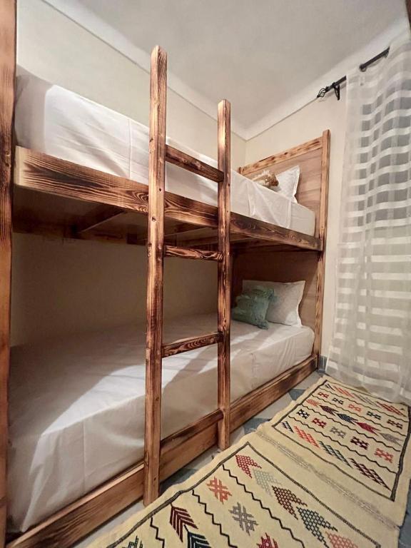 Postel nebo postele na pokoji v ubytování Peekaboo Hostel