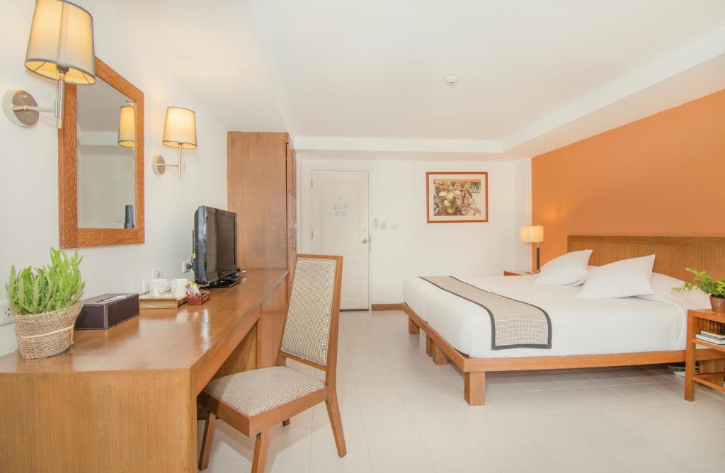 Postel nebo postele na pokoji v ubytování Veranda Lodge