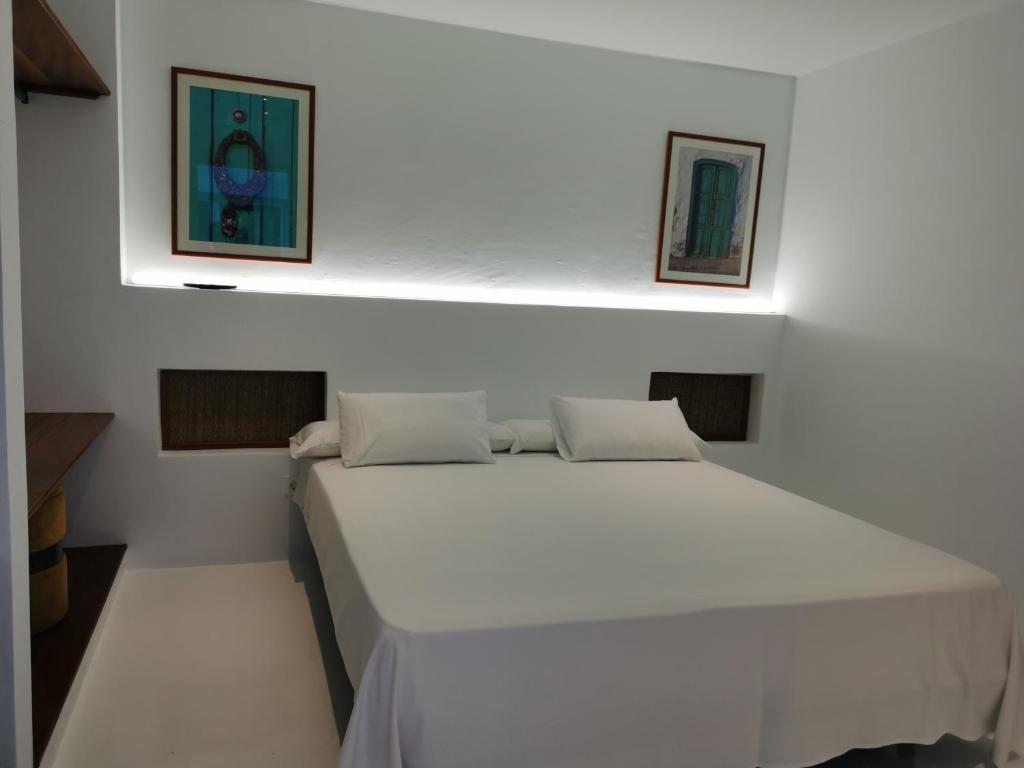 Postel nebo postele na pokoji v ubytování Villa Tagoror