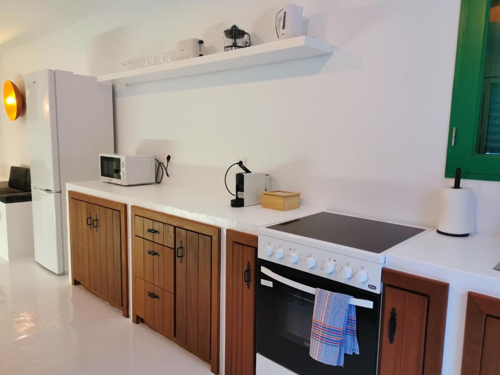 Kuchyň nebo kuchyňský kout v ubytování Villa Tagoror