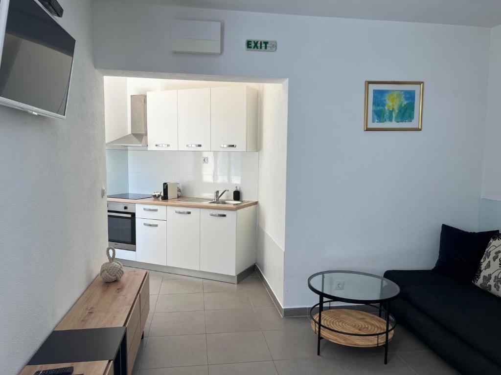 Kuchyňa alebo kuchynka v ubytovaní Apartments Domani