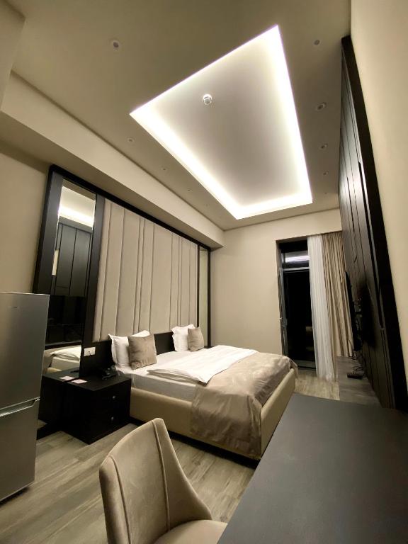 Postel nebo postele na pokoji v ubytování SOHO Hotel City Centre