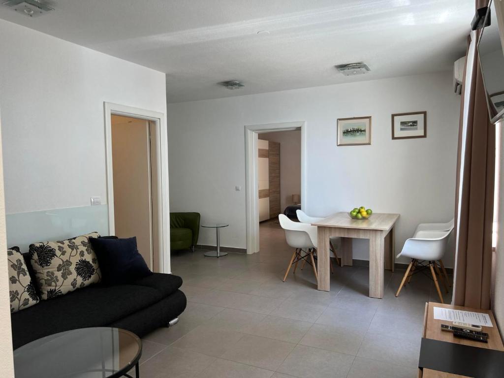 Posedenie v ubytovaní Apartments Domani
