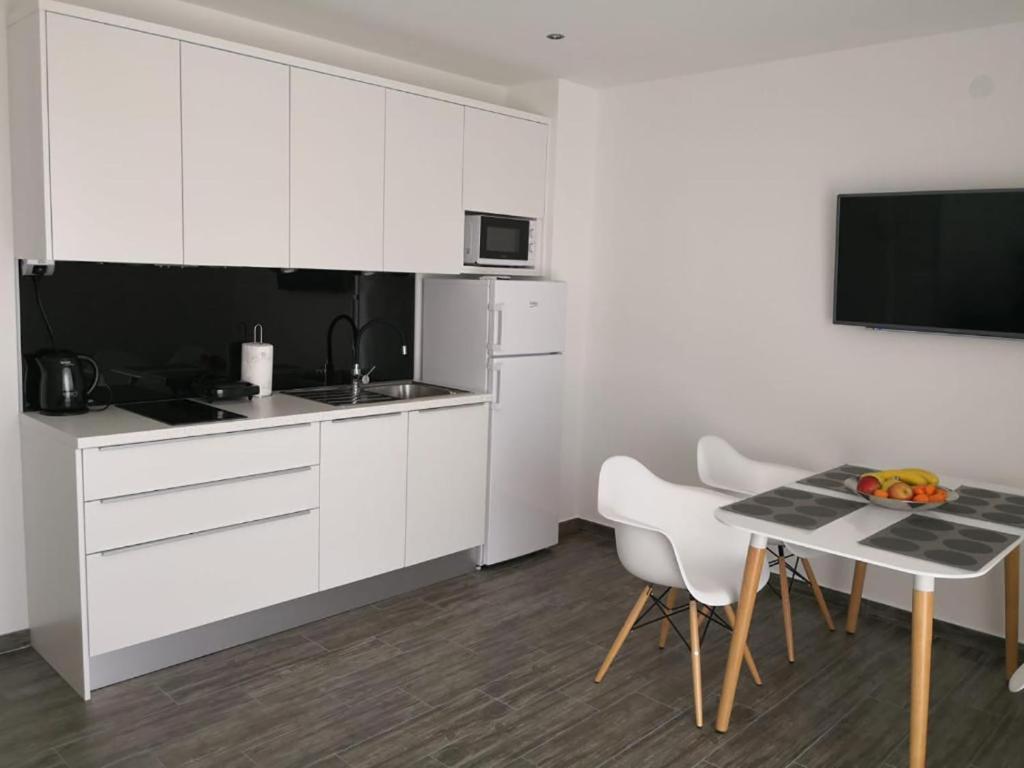 Kuchyňa alebo kuchynka v ubytovaní Apartments Domani