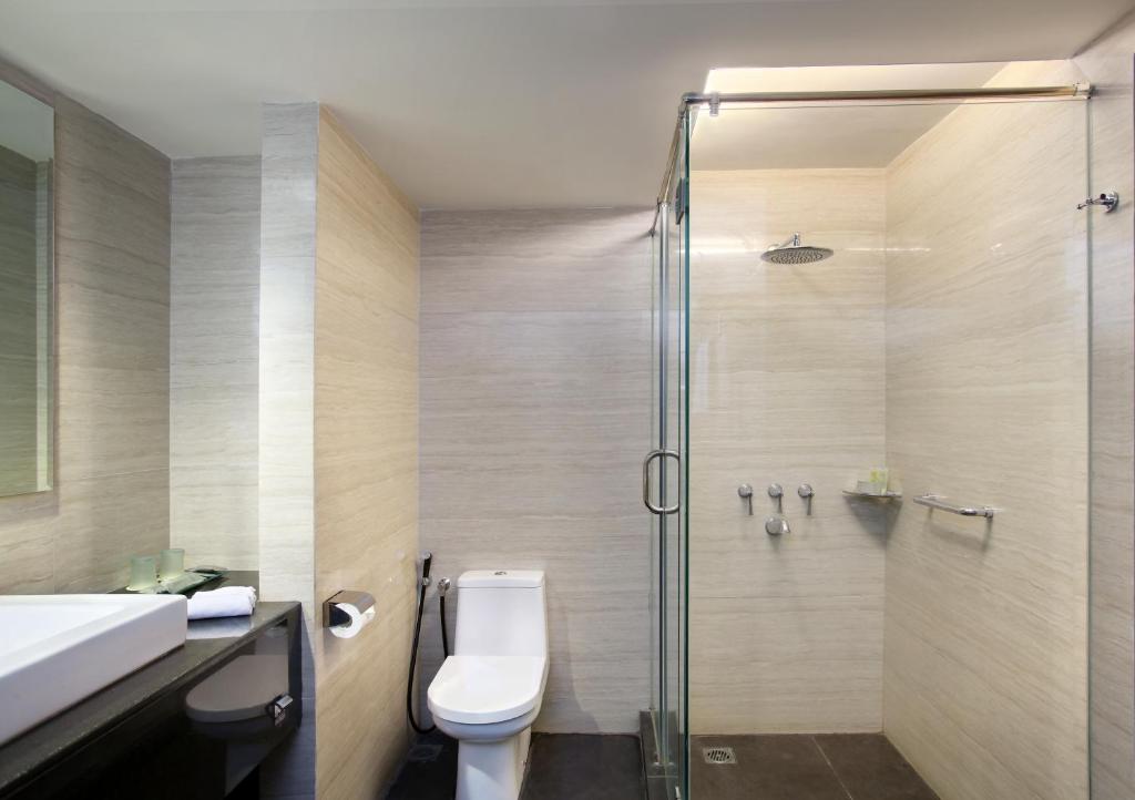 Koupelna v ubytování Hotel Santika Mataram
