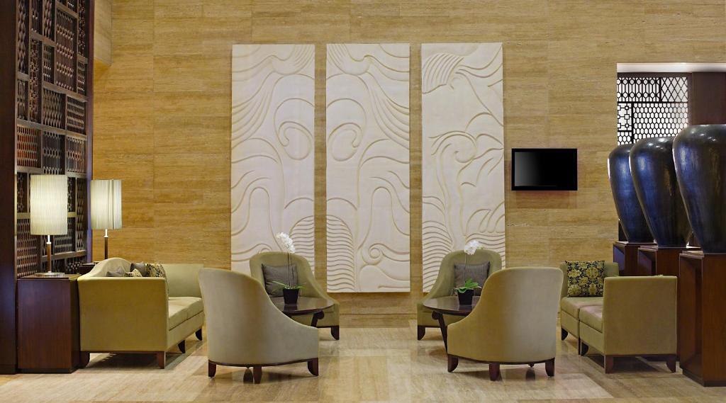 TV a/nebo společenská místnost v ubytování Hotel Santika Mataram