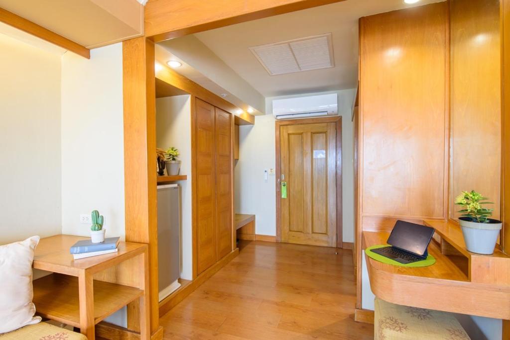 TV a/nebo společenská místnost v ubytování Veranda Lodge