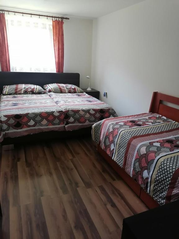 Postel nebo postele na pokoji v ubytování ubytování v apartmánu