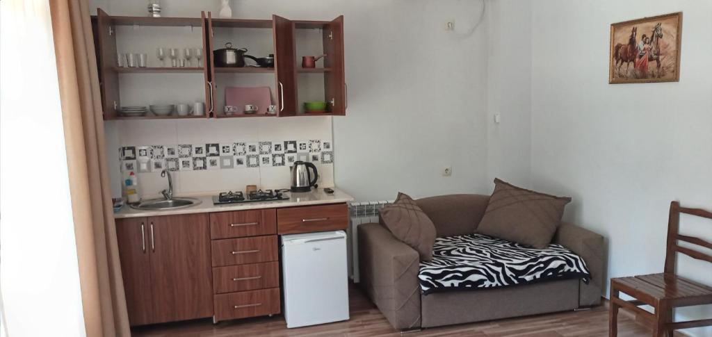 Kuchyň nebo kuchyňský kout v ubytování Hotel TWINS ANNA