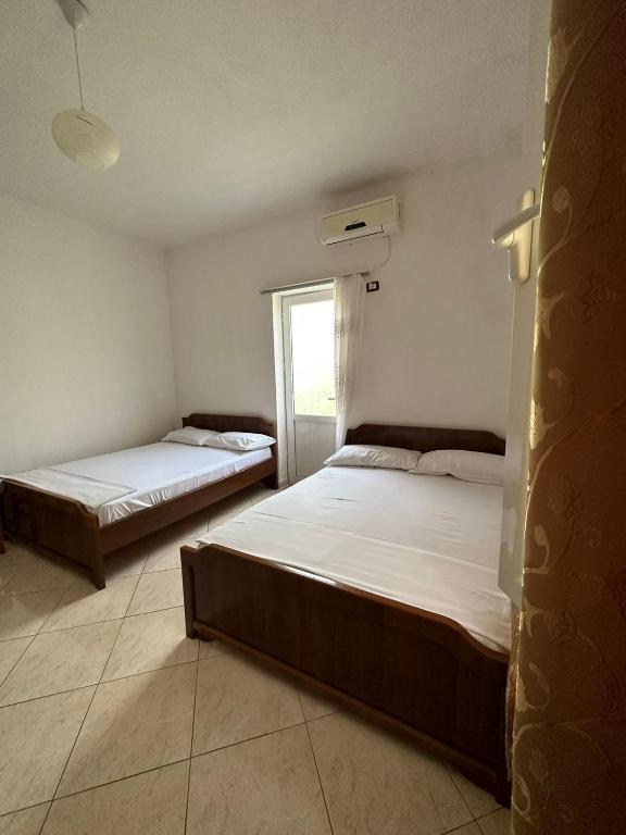 Postel nebo postele na pokoji v ubytování Harmony
