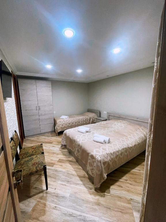 Postel nebo postele na pokoji v ubytování Guest house LALO
