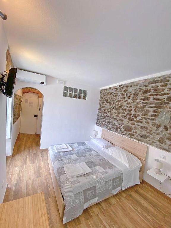 Postel nebo postele na pokoji v ubytování Double room "Malvasia" - Casedirio
