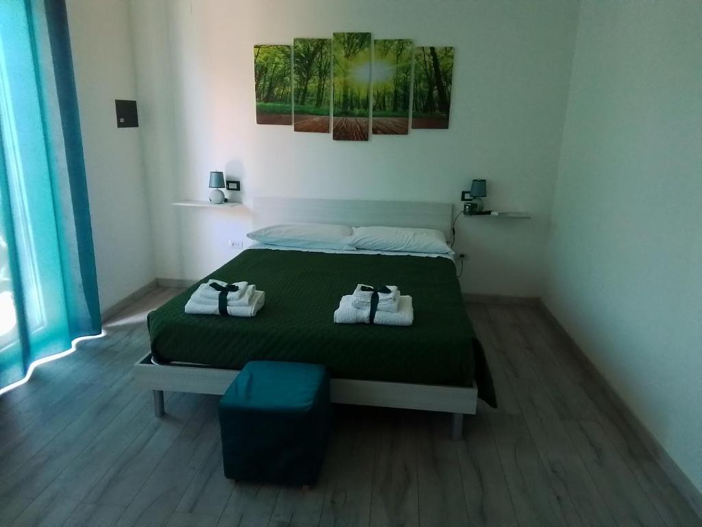Postel nebo postele na pokoji v ubytování B&B Ospedale Pescara
