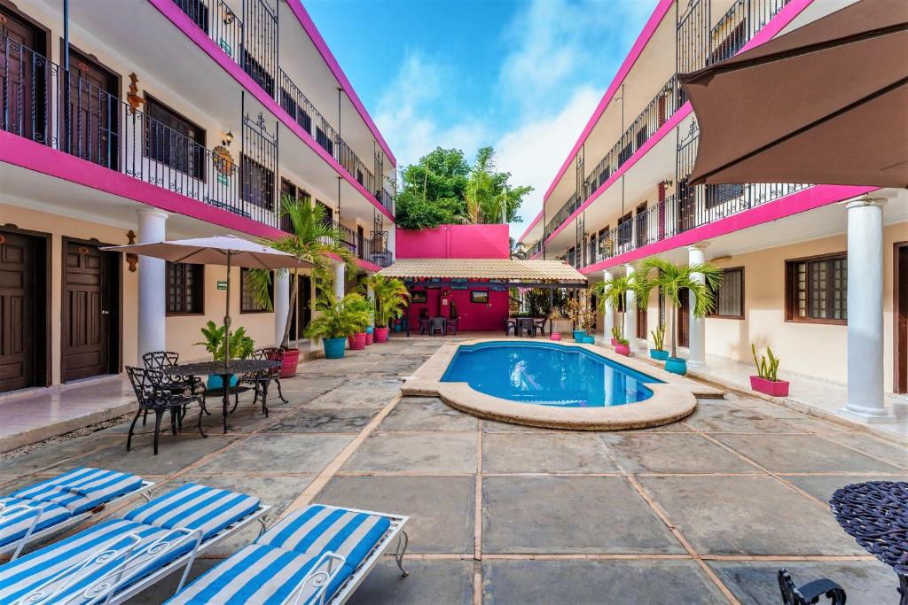 Bazén v ubytování Hotel San Juan Mérida nebo v jeho okolí