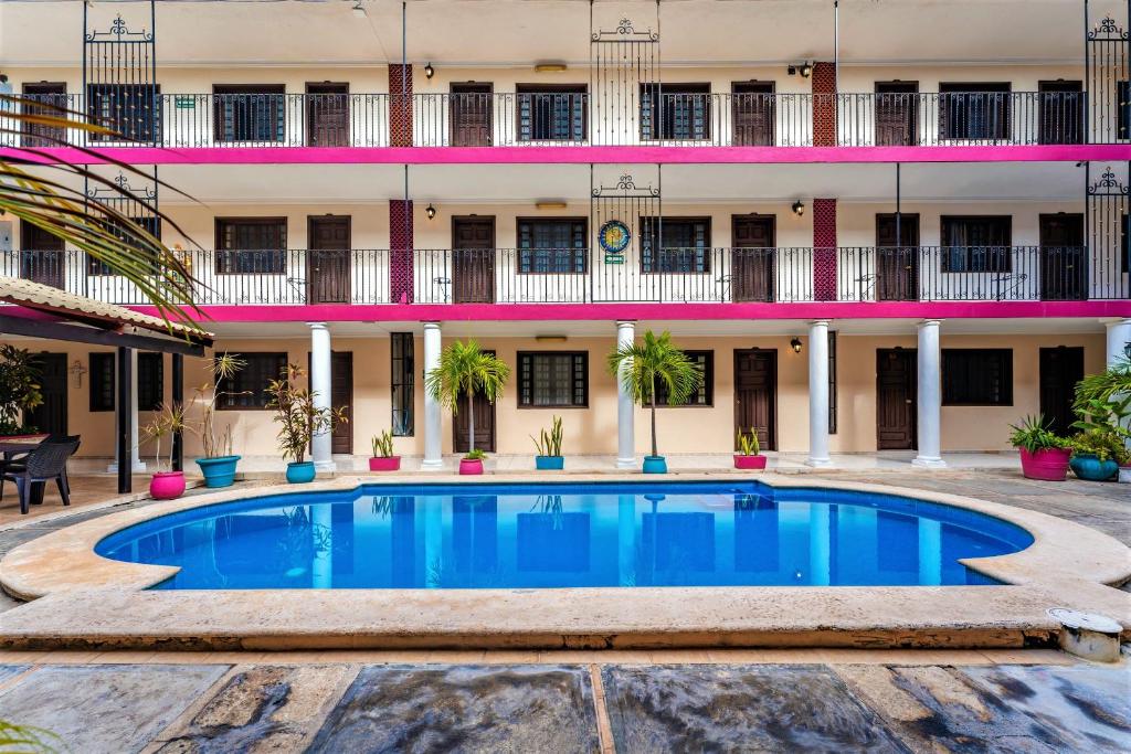 Bazén v ubytování Hotel San Juan Mérida nebo v jeho okolí