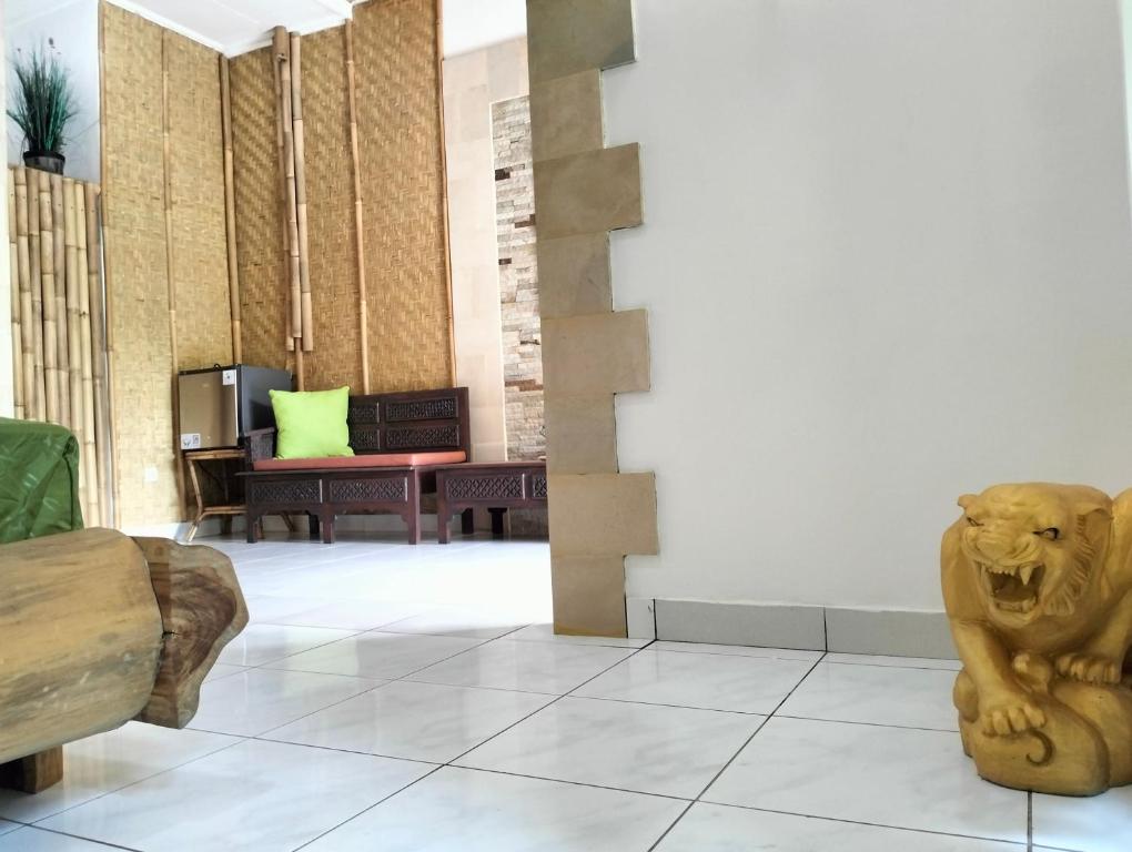 Posezení v ubytování Kaia Lovina Guest House Junior Suite