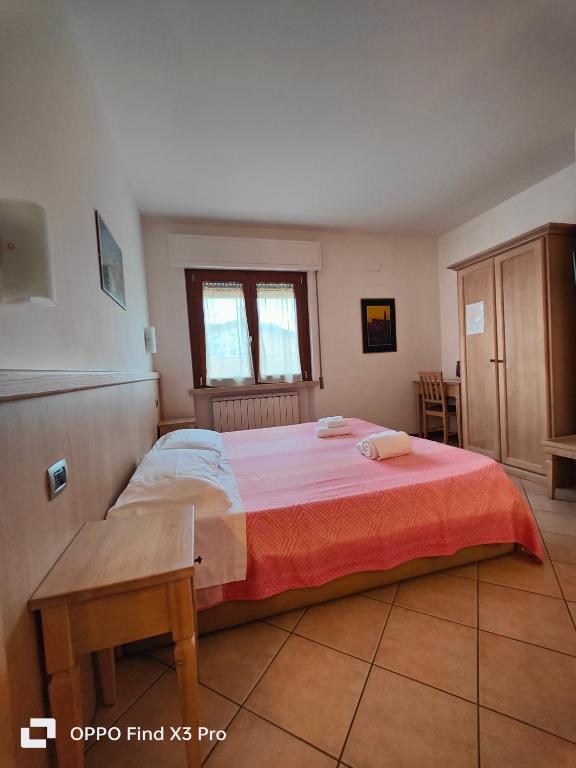 Postel nebo postele na pokoji v ubytování Camere Rufino A POCHI CHILOMETRI DAL CENTRO DI PERUGIA E DA ASSISI