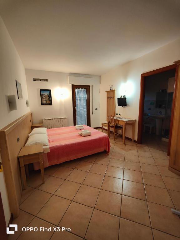 Postel nebo postele na pokoji v ubytování Camere Rufino A POCHI CHILOMETRI DAL CENTRO DI PERUGIA E DA ASSISI