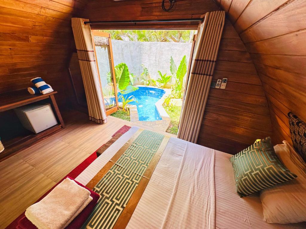 Bazén v ubytování Palmyra Nature Resort Sigiriya nebo v jeho okolí