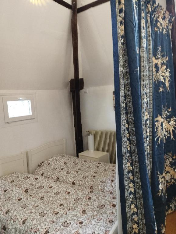 Posteľ alebo postele v izbe v ubytovaní Gîtes "La Sérénité Marivaloise"