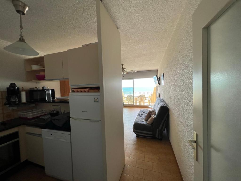 Kuchyň nebo kuchyňský kout v ubytování appartement vue mer à la plage
