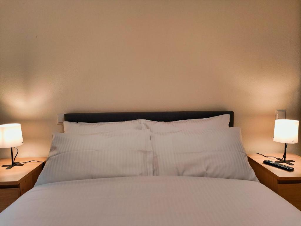 Postel nebo postele na pokoji v ubytování Elegant Vista Residence