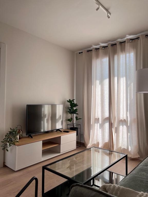 TV a/nebo společenská místnost v ubytování TramaCalm
