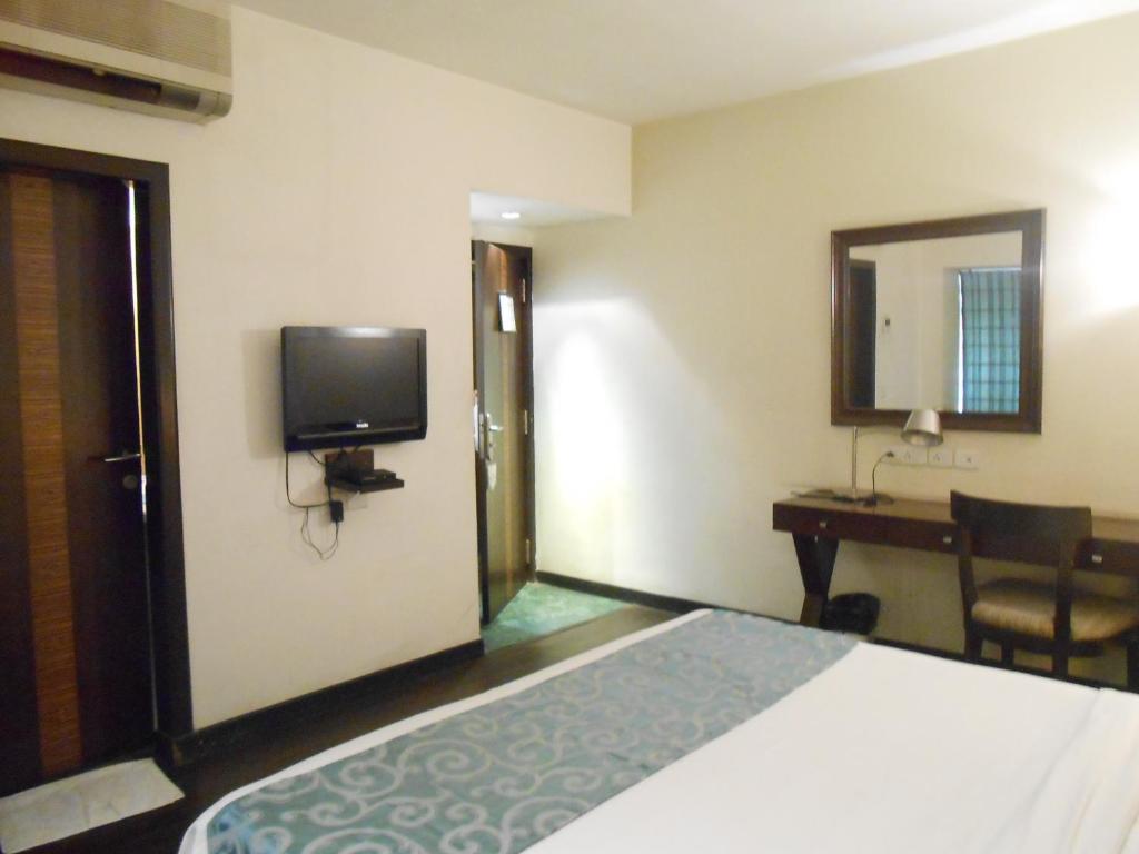 TV a/nebo společenská místnost v ubytování Hotel Metropole