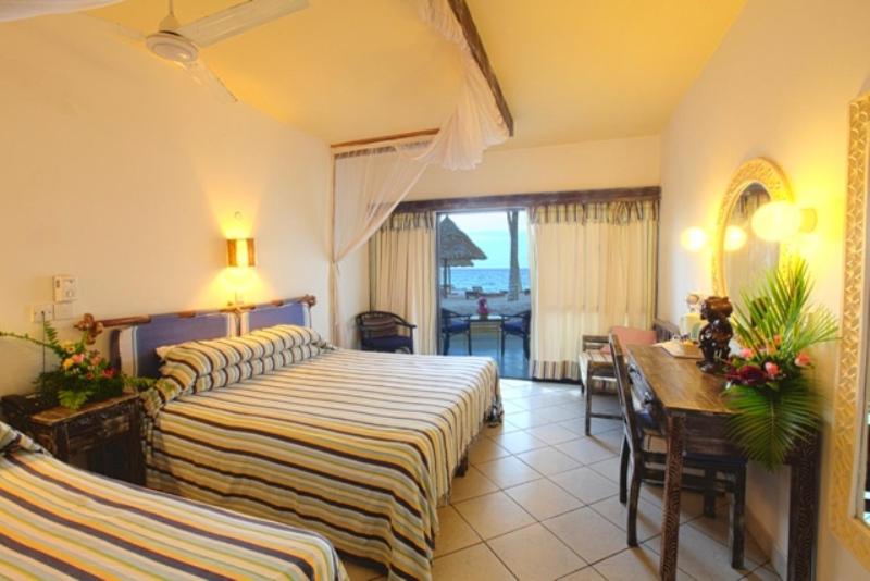 Postel nebo postele na pokoji v ubytování Turtle Bay Beach Club- All Inclusive