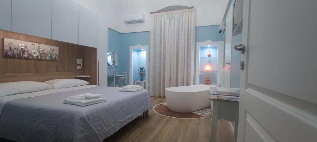 Ένα ή περισσότερα κρεβάτια σε δωμάτιο στο Puglia Holiday Home