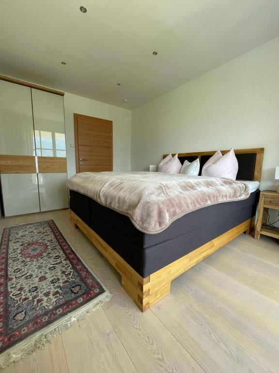 Postel nebo postele na pokoji v ubytování Luxury-Suites Traunsee