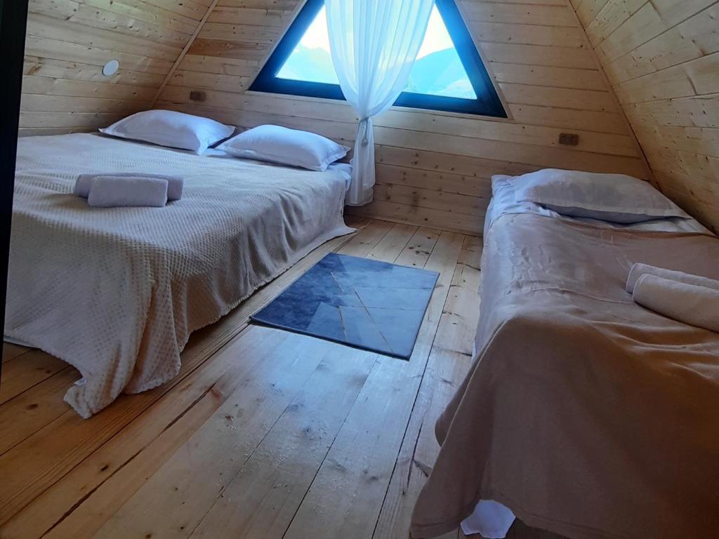 Postel nebo postele na pokoji v ubytování Cottage THORI Stephantsminda,Achkhoti