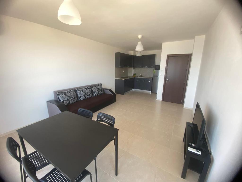 TV a/nebo společenská místnost v ubytování Sunrise Apartments