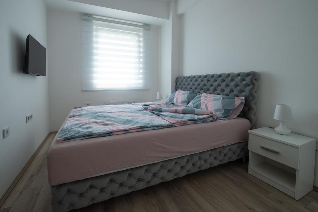 Postel nebo postele na pokoji v ubytování Petković apartmani 48