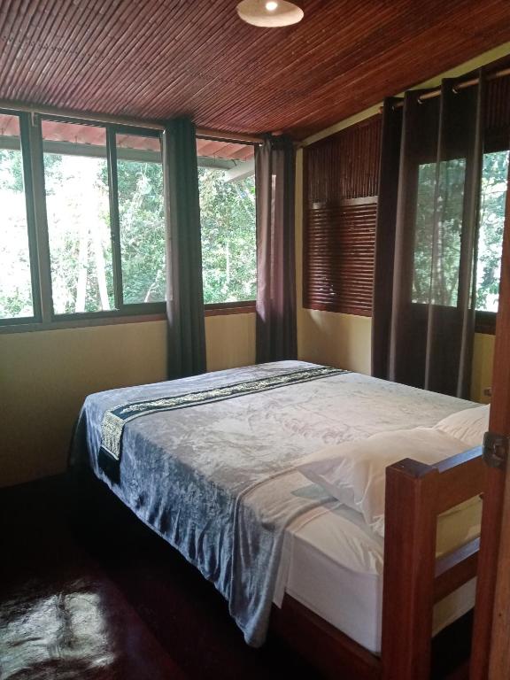 Postel nebo postele na pokoji v ubytování Hotel Anachoreo