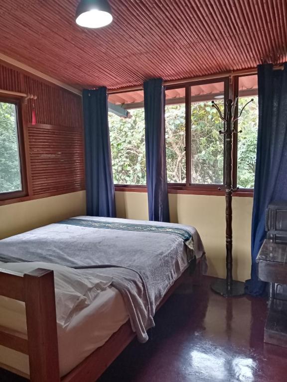 Postel nebo postele na pokoji v ubytování Hotel Anachoreo