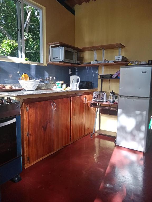 Kuchyň nebo kuchyňský kout v ubytování Hotel Anachoreo