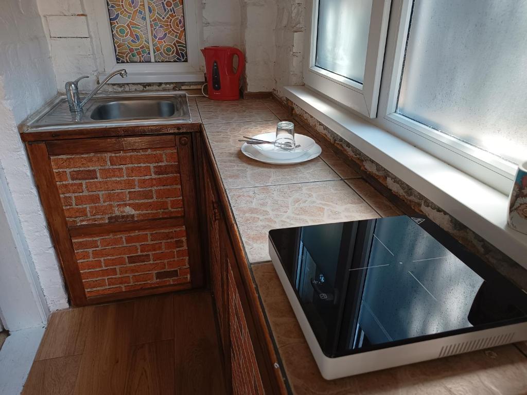 Kuchyň nebo kuchyňský kout v ubytování Expo Home Stay