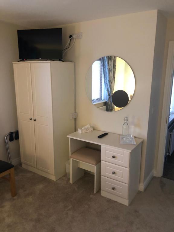 TV a/nebo společenská místnost v ubytování Harbour View Accommodation