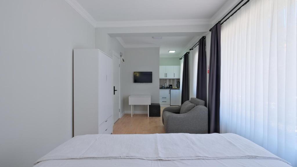 Postel nebo postele na pokoji v ubytování Centralflatsfethiye