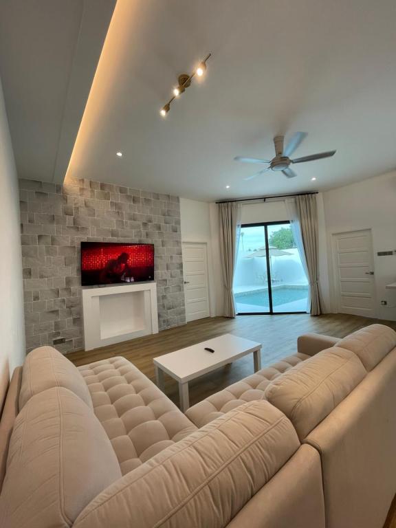 TV a/nebo společenská místnost v ubytování Dz Residence Tunjong