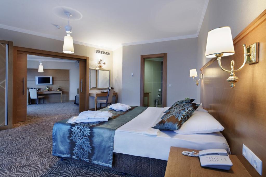 Postel nebo postele na pokoji v ubytování Saphir Hotel & Villas