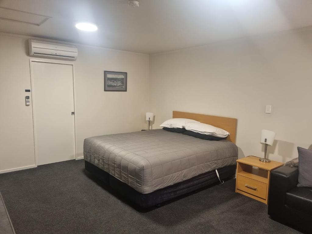 Voodi või voodid majutusasutuse Jafa's Motels toas