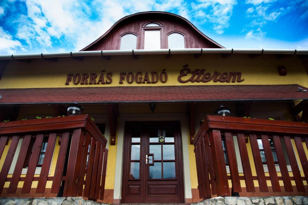 a church with a sign that reads francis roberts roadood church at Forrás Fogadó in Bükkszék