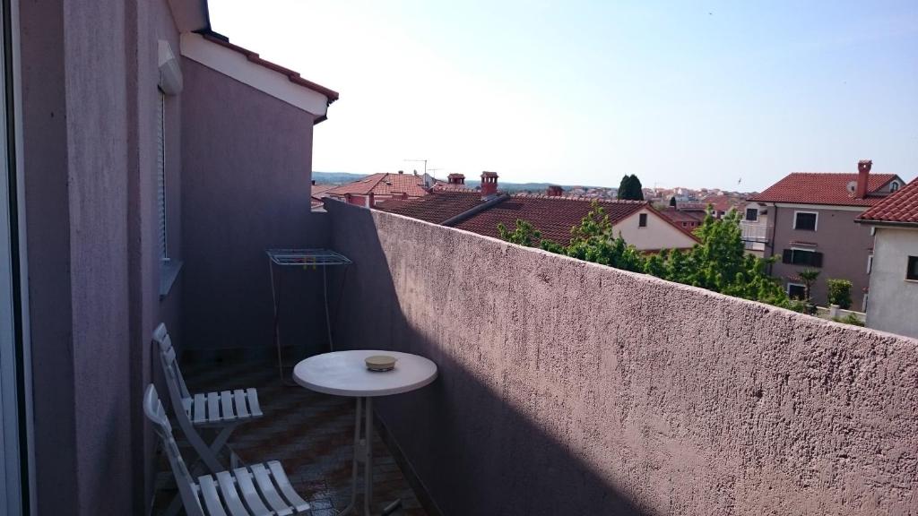 Ein Balkon oder eine Terrasse in der Unterkunft Apartments Jaklin Rovinj